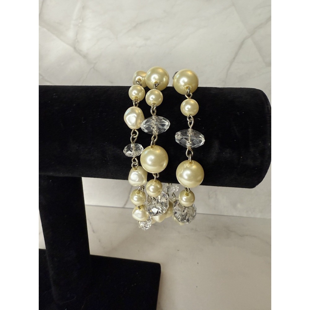 Triple strand faux pearl and silver bracelet with clear beads